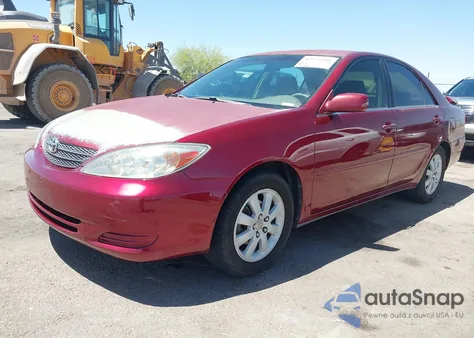 2002 Toyota Camry Le z USA, uszkodzony, nr VIN 4T1BE32K52U082454
